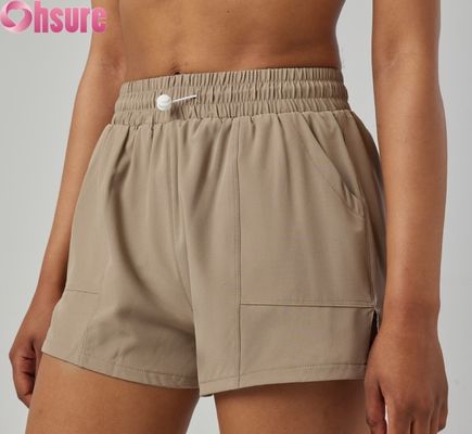 Shorts esportivos femininos de cintura alta, secagem rápida, respiráveis, modernos para corrida e exercícios, com bolsos