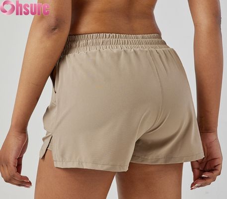 Shorts esportivos femininos de cintura alta, secagem rápida, respiráveis, modernos para corrida e exercícios, com bolsos