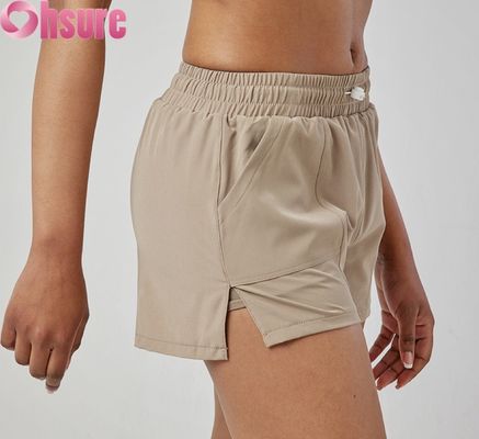 Shorts esportivos femininos de cintura alta, secagem rápida, respiráveis, modernos para corrida e exercícios, com bolsos