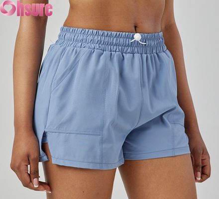 Shorts esportivos femininos de cintura alta, secagem rápida, respiráveis, modernos para corrida e exercícios, com bolsos