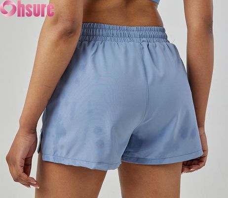 Shorts esportivos femininos de cintura alta, secagem rápida, respiráveis, modernos para corrida e exercícios, com bolsos