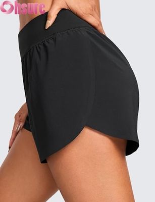 Shorts atléticos de corrida femininos estilo golfinho de cintura alta com forro de malha sexy e fenda alta de 3\" confortáveis para ioga