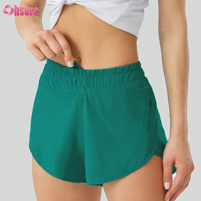 Shorts de ioga casuais femininos Altamente respiráveis Calças de treino de poliéster de secagem rápida com cintura elástica Bolsos para desporto e corrida