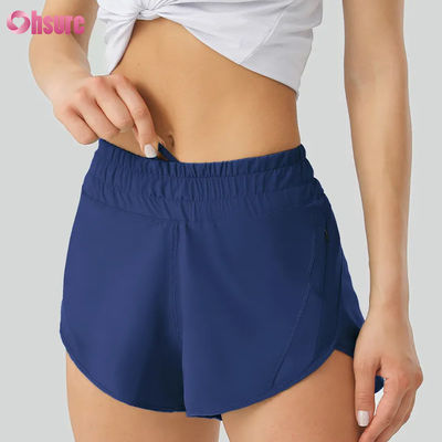 Shorts de ioga casuais femininos Altamente respiráveis Calças de treino de poliéster de secagem rápida com cintura elástica Bolsos para desporto e corrida