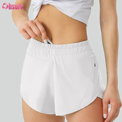 Shorts de ioga casuais femininos Altamente respiráveis Calças de treino de poliéster de secagem rápida com cintura elástica Bolsos para desporto e corrida