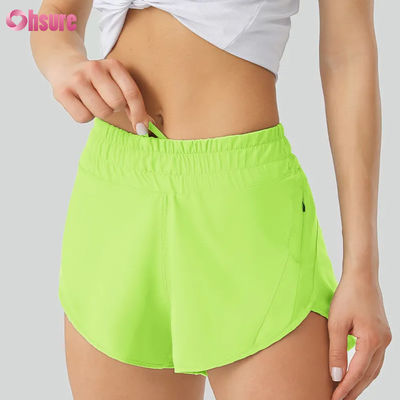 Shorts de ioga casuais femininos Altamente respiráveis Calças de treino de poliéster de secagem rápida com cintura elástica Bolsos para desporto e corrida