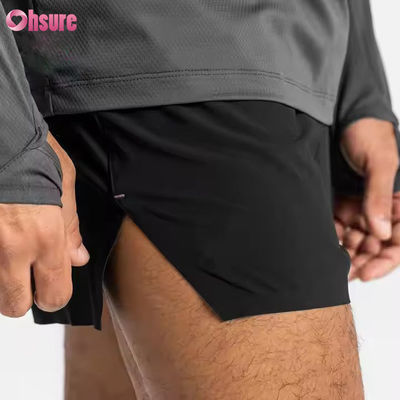 Calções de ginástica masculinos com cintura elástica e bolsos com zíper personalizados, estampados em jacquard, para corrida e treino