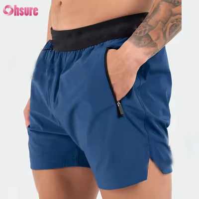 Logotipo personalizado na cintura Bolsos de poliéster Bainha dividida Pour Hommes Sports Active Shorts atléticos de ginástica para homens