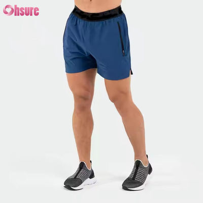 Logotipo personalizado na cintura Bolsos de poliéster Bainha dividida Pour Hommes Sports Active Shorts atléticos de ginástica para homens