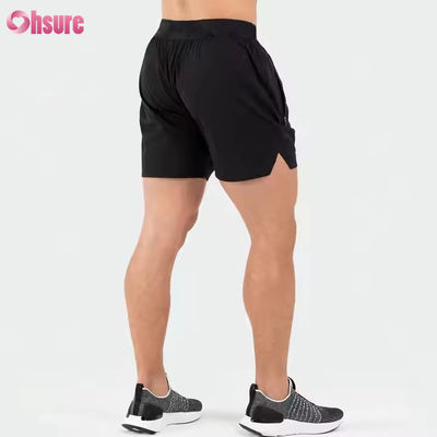 Logotipo personalizado na cintura Bolsos de poliéster Bainha dividida Pour Hommes Sports Active Shorts atléticos de ginástica para homens