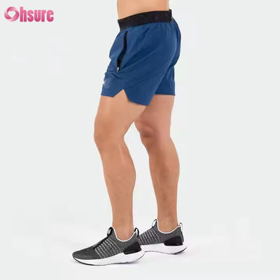Logotipo personalizado na cintura Bolsos de poliéster Bainha dividida Pour Hommes Sports Active Shorts atléticos de ginástica para homens