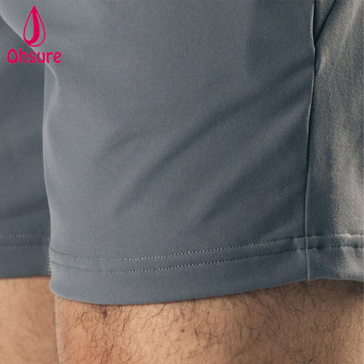 Design de logotipo personalizado OEM Material leve Estiramento em quatro direções Bolsos frontais profundos Shorts esportivos masculinos Shorts de treino de ginástica