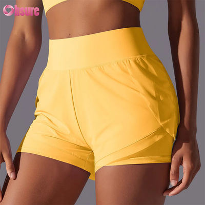 2025 Shorts de corrida femininos de cintura alta respiráveis para fitness Atacado Treino de verão Calças esportivas de corrida Design novo e quente