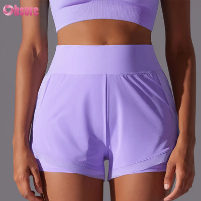 2025 Shorts de corrida femininos de cintura alta respiráveis para fitness Atacado Treino de verão Calças esportivas de corrida Design novo e quente