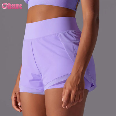 2025 Shorts de corrida femininos de cintura alta respiráveis para fitness Atacado Treino de verão Calças esportivas de corrida Design novo e quente