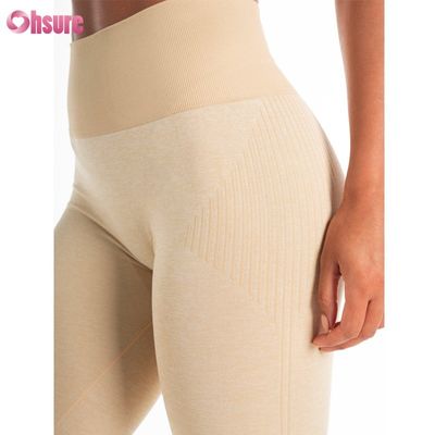 Produtor de fábrica de vendas diretas calças esportivas de cor sólida calças de treino personalizáveis fitness usar calças de design sem costura para mulheres