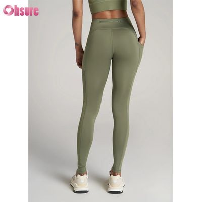 Calças esportivas texturizadas Calças esportivas de yoga fitness Calças esportivas com fecho de creme Calças esportivas de yoga para mulheres