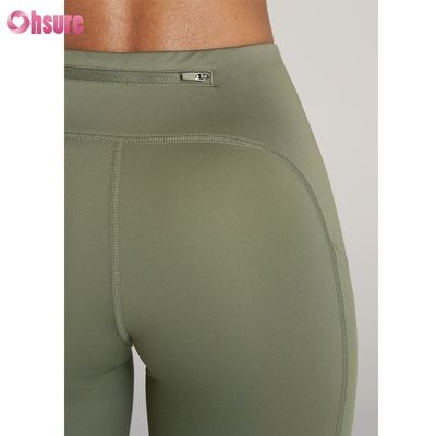 Calças esportivas texturizadas Calças esportivas de yoga fitness Calças esportivas com fecho de creme Calças esportivas de yoga para mulheres