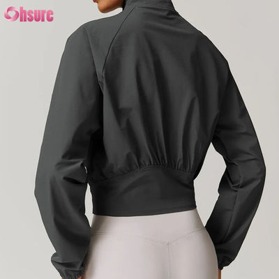 Jaquetas de treino com zíper de alta qualidade para mulheres Fitness personalizado Golas altas à prova de vento Tops de ioga por atacado Malha de inverno Distintivo