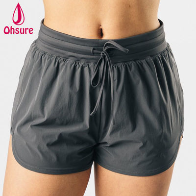 Shorts esportivos atléticos de cintura alta com design de corte alto OEM de alta qualidade Feminino Fitness Ginásio Corrida Yoga Calças Curtas Casuais Tecidas