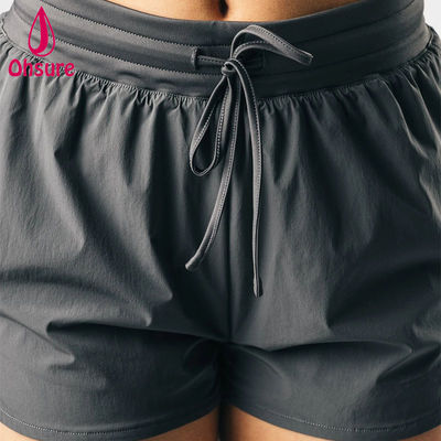 Shorts esportivos atléticos de cintura alta com design de corte alto OEM de alta qualidade Feminino Fitness Ginásio Corrida Yoga Calças Curtas Casuais Tecidas