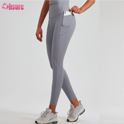 Leggings personalizados Gym Wear Multicolor Calças clássicas de ioga Leggings de treino Feminino Scrunch Leggings de ioga Vestuário esportivo padrão sólido