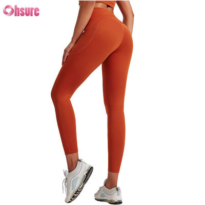 Leggings personalizados Gym Wear Multicolor Calças clássicas de ioga Leggings de treino Feminino Scrunch Leggings de ioga Vestuário esportivo padrão sólido
